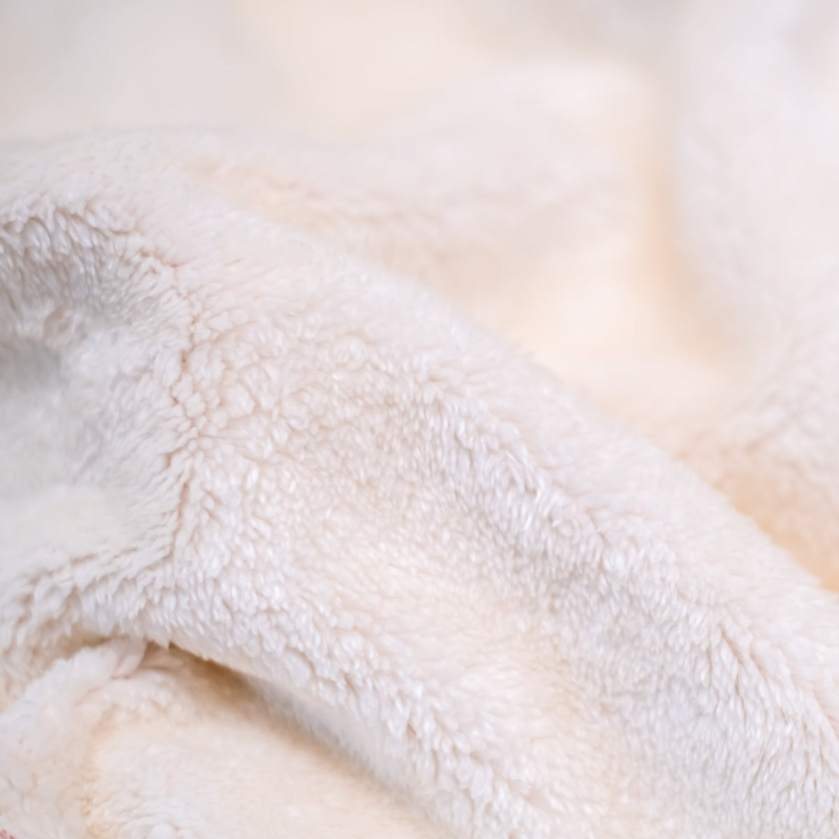 Squatchfuzz Tiger Hoodie fabric close-up showing soft and cozy texture for ultimate comfort.